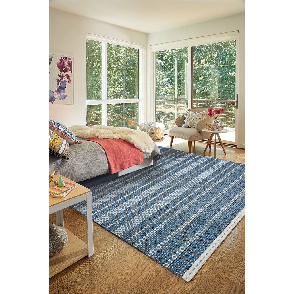 Area rug on hardwood floor | Carpetland USA