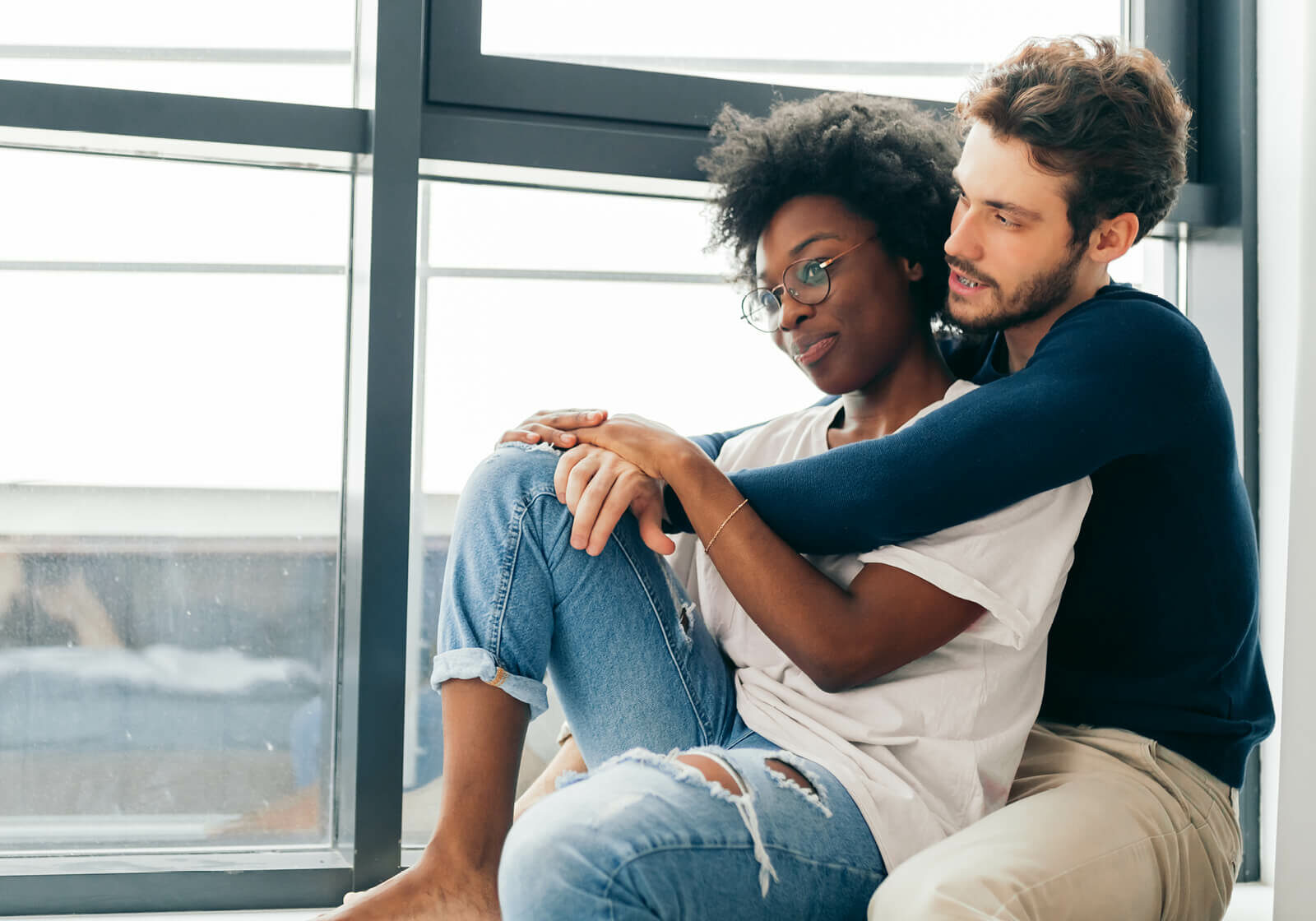 Couple sitting by a window | Carpetland USA