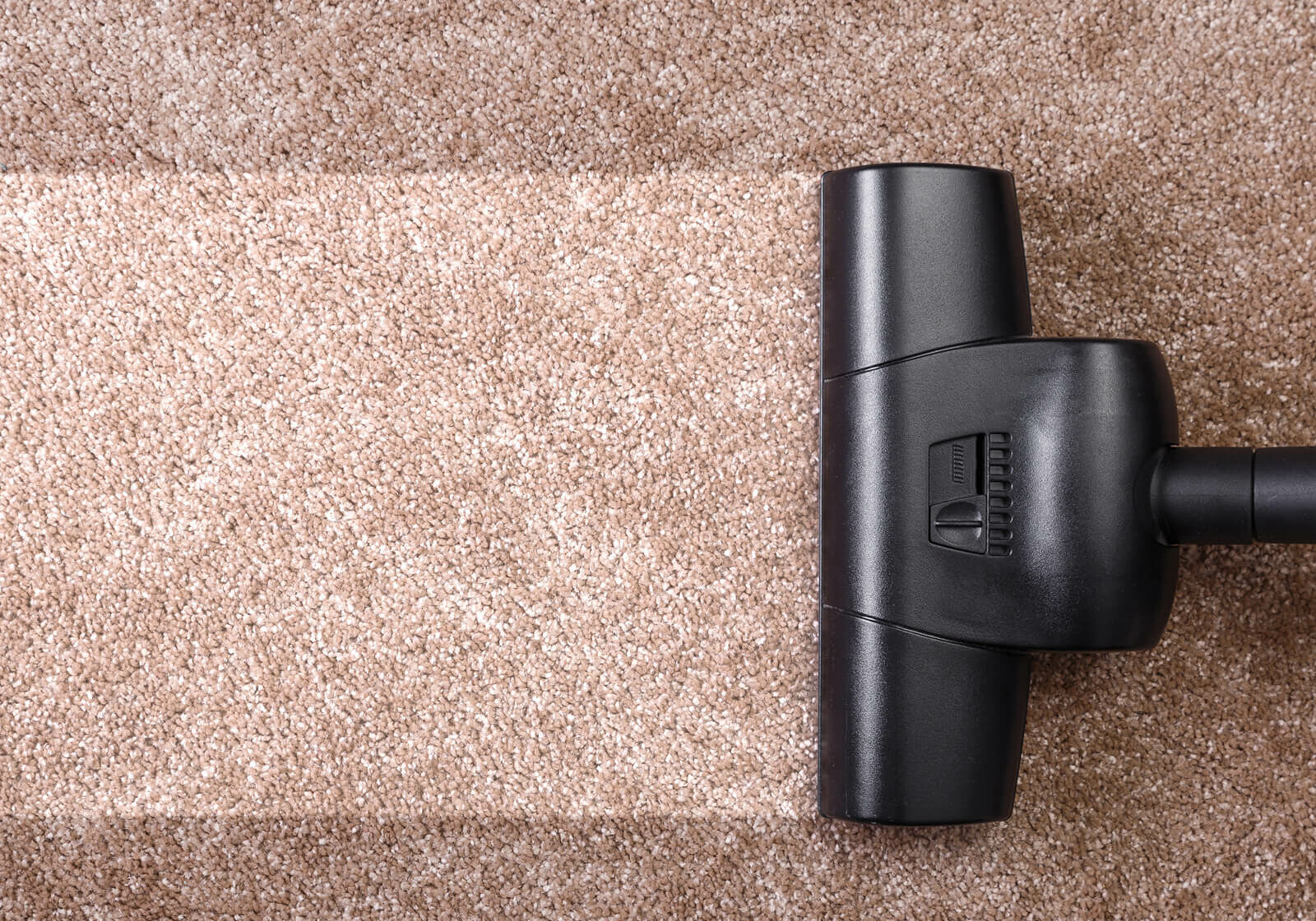 Vacuuming carpeting | Carpetland USA